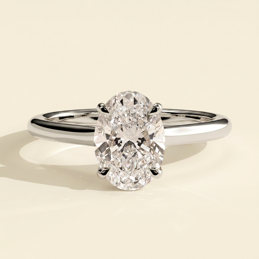 The Meira - Oval Cut Lab Grown Diamond Four Claw Cathedral Solitaire Engagement Ring - White Gold