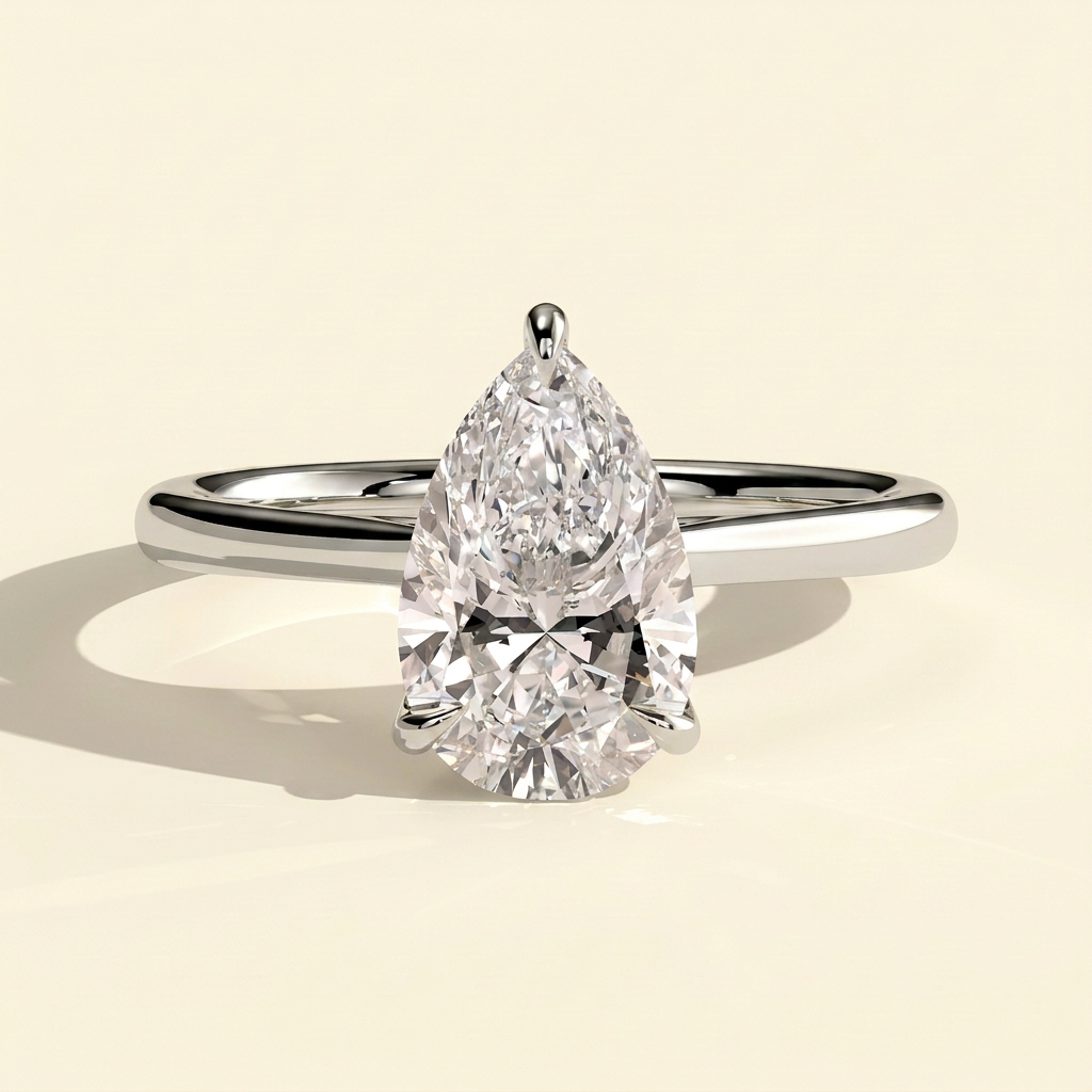 The Auva - Pear Cut Lab Grown Diamond Solitaire with Hidden Halo and Cathedral Setting Ring