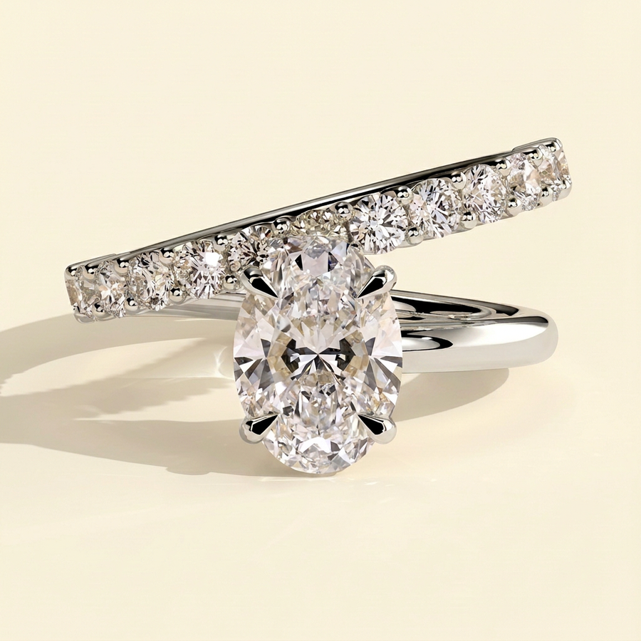 The Veora - Oval Cut Lab Grown Diamond Solitaire with Angled Pave Band and a Half Engagement Ring - White Gold