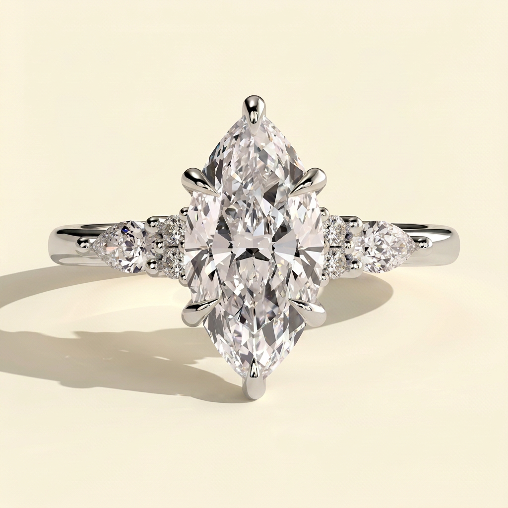 The Yara - Marquise Cut Lab Grown Diamond Six Claw Three Stone with Pear and Round Shoulder Stones Engagement Ring