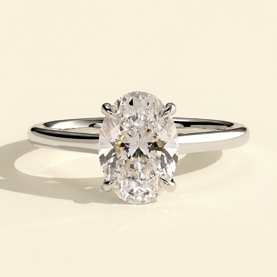 The Jovia - Oval Cut Lab Grown Diamond Four Claw Solitaire with Open Trellis Gallery Engagement Ring - White Gold