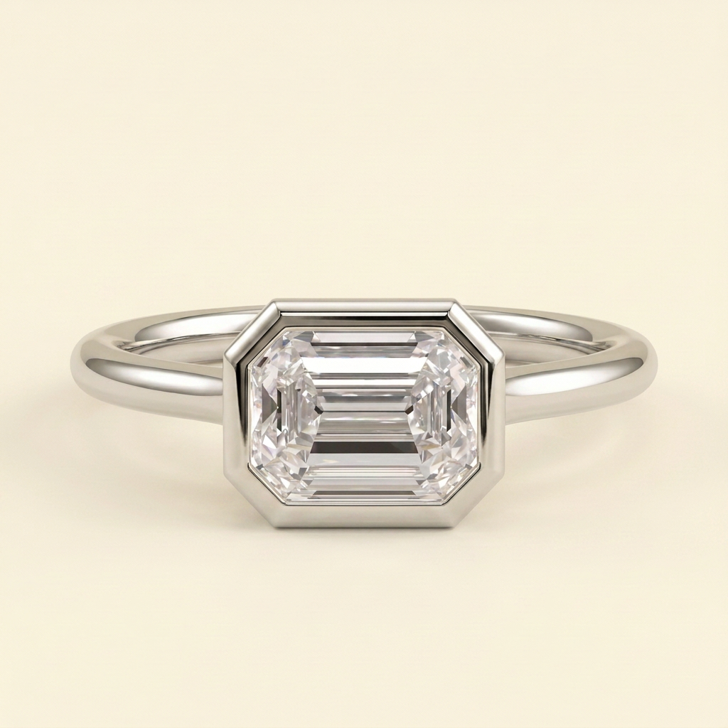 The Zaia - Emerald Cut Lab Grown Diamond East West Bezel Set Solitaire with Open Cathedral Setting Engagement Ring