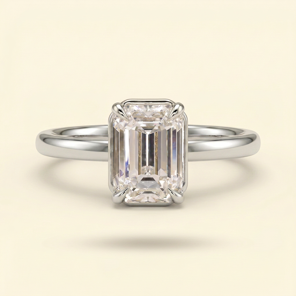 The Coralie - Emerald Cut Lab Grown Diamond Low Set Solitaire with Bezel Frame Engagement Ring