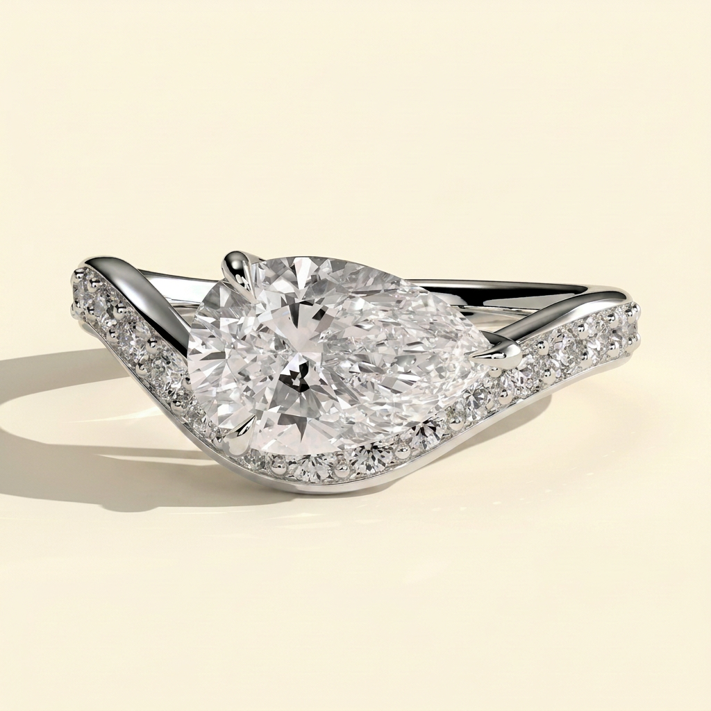 The Prima - East West Pear Lab Grown Diamond Engagement Ring with Wave Pave Band
