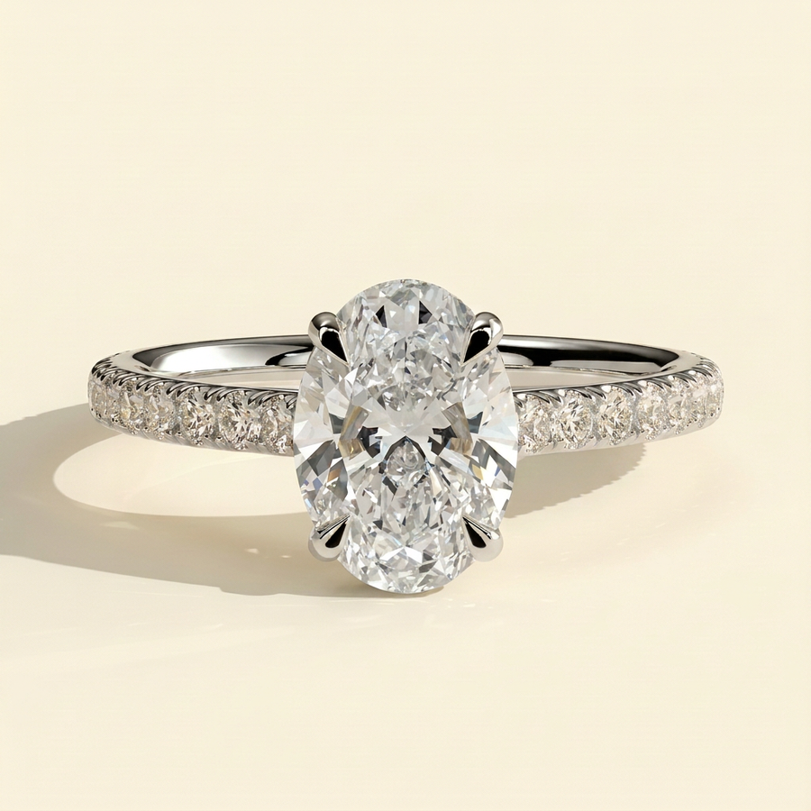 The Risela - Oval Cut Lab Grown Diamond Four Claw Solitaire with Hidden Halo and Cathedral Pave Band Engagement Ring - White Gold