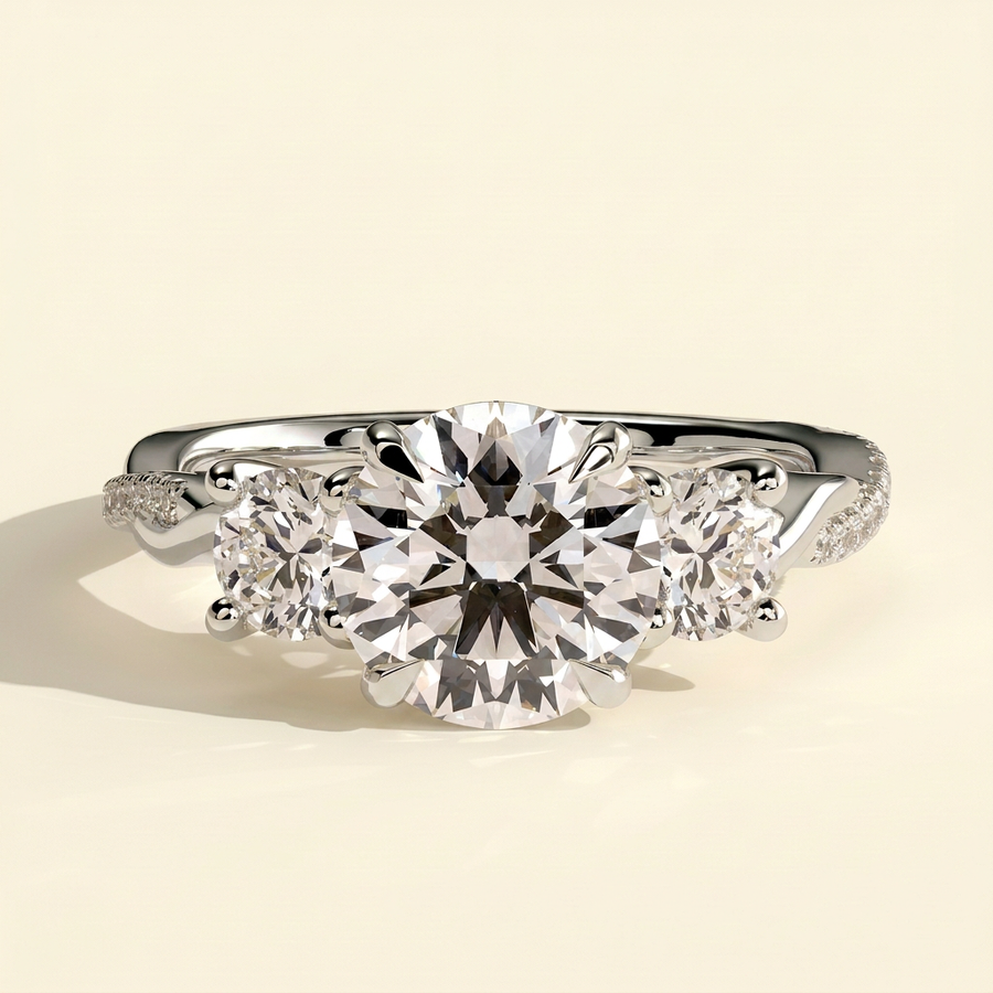 The Golda - Round Cut Lab Grown Diamond Three Stone Engagement Ring with Twisted Pave Band - White Gold