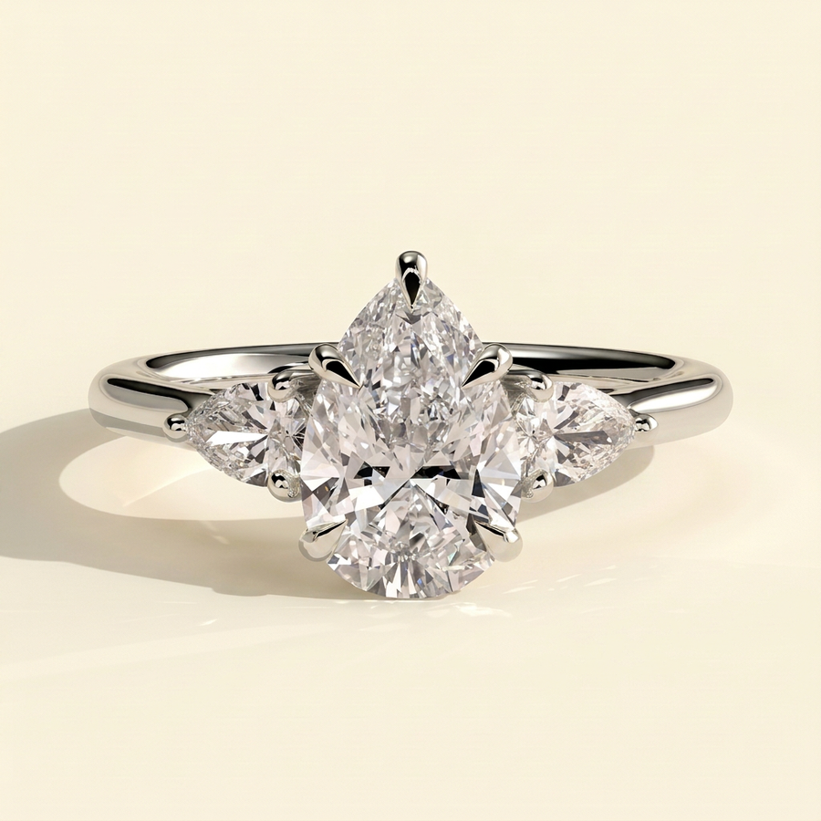 The Viorela - Pear Cut Lab Grown Diamond Three Stone Engagement Ring with Pear Side Stones and Floating Cathedral Setting - White Gold