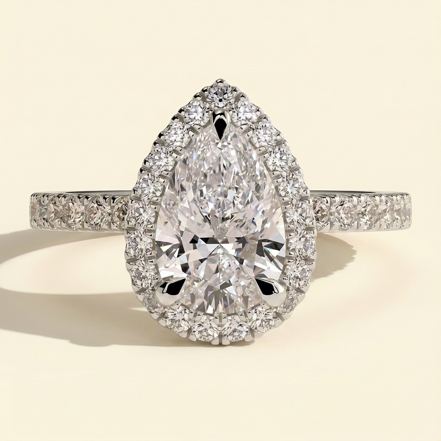 The Minelle - Pear Cut Lab Grown Diamond Three Claw Halo with Pave Band Engagement Ring - White Gold