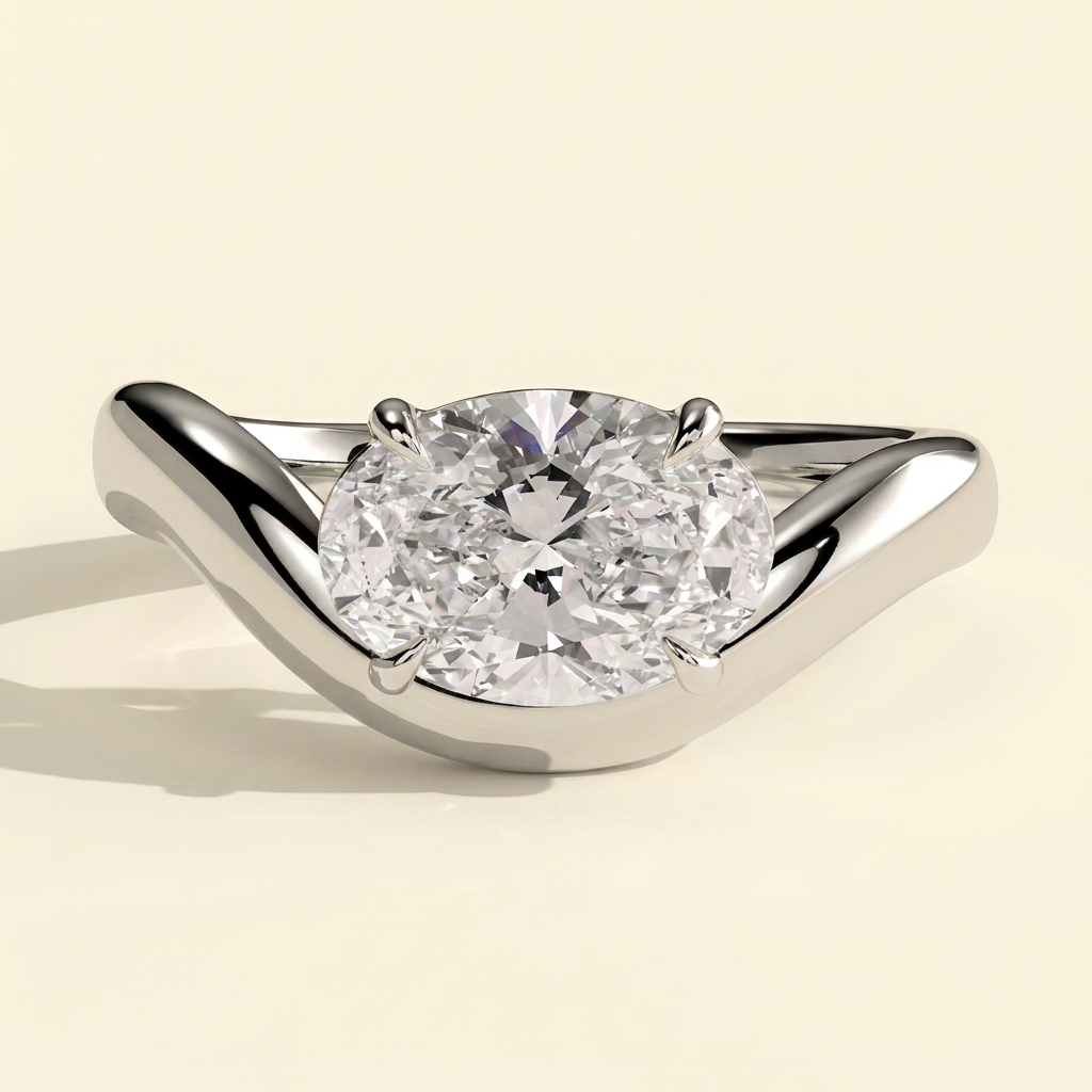 The Rhea - Oval Cut Lab Grown Diamond East West Solitaire Engagement Ring with Wave Band
