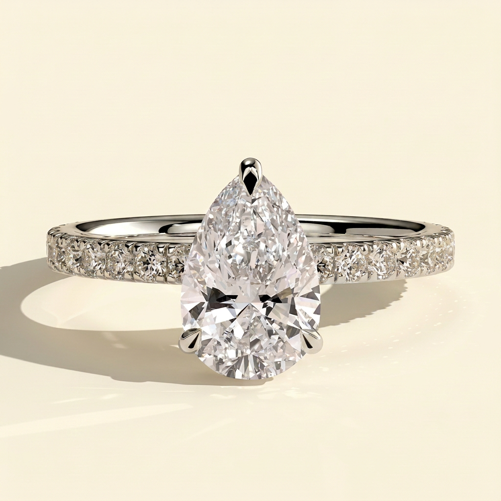The Hestia - Pear Cut Lab Grown Diamond Wrap Around Hidden Halo Solitaire with Pave Band Engagement Ring