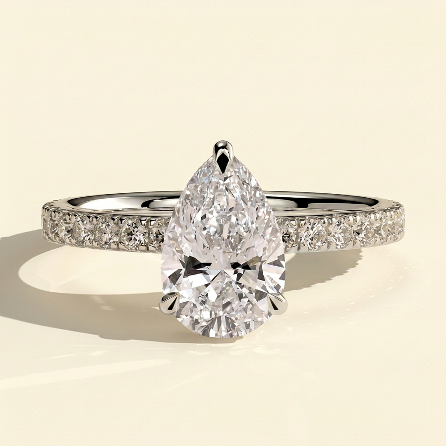 The Hestia - Pear Cut Lab Grown Diamond Wrap Around Hidden Halo Solitaire with Pave Band Engagement Ring - White Gold