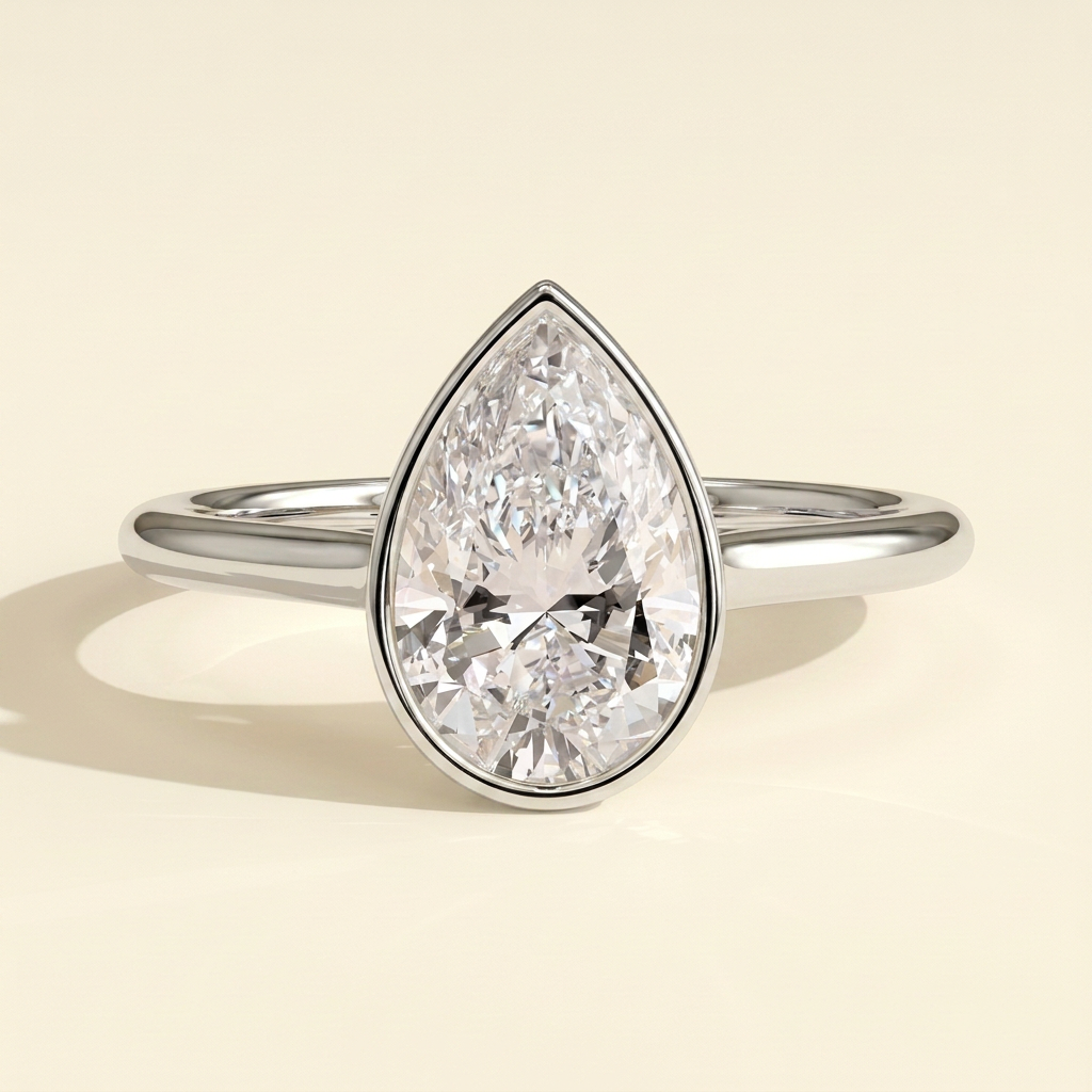 The Delphi - Pear Cut Lab Grown Diamond Bezel Set Cathedral Solitaire Engagement Ring