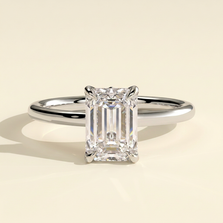 The Luvelle - Emerald Cut Lab Grown Diamond Claw Solitaire with Petal Gallery and Accent Leaf Detail Engagement Ring - White Gold