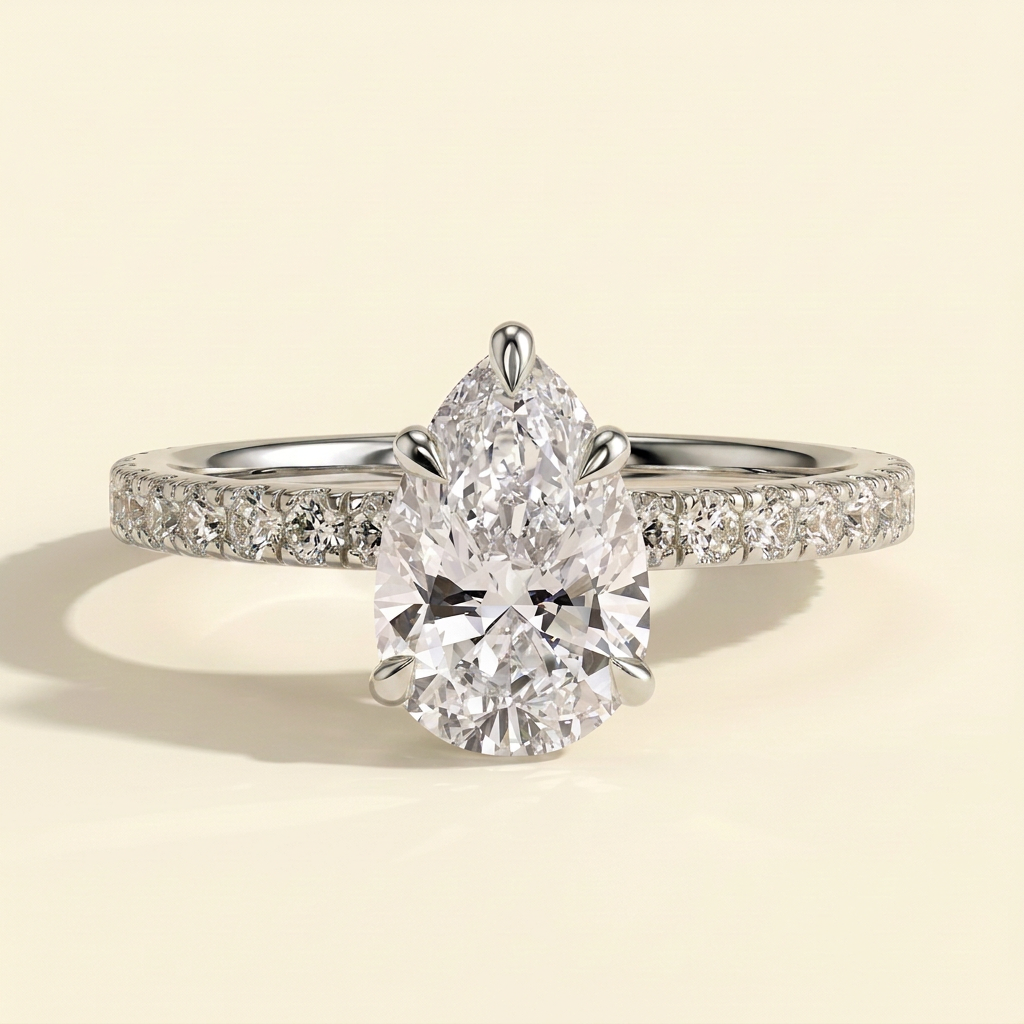 The Vita - Pear Cut Lab Grown Diamond Hidden Halo Engagement Ring with Pave Band