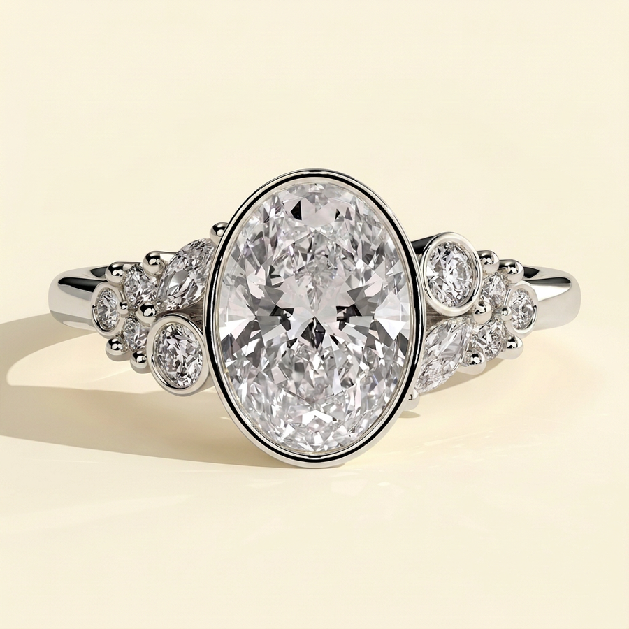 The Gemelle - Oval Cut Lab Grown Diamond Bezel Set Engagement Ring with Clustered Shoulder Accents - White Gold