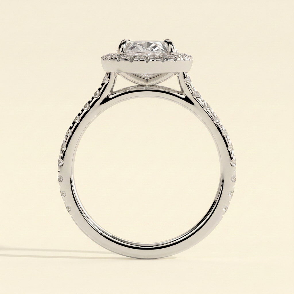 The Kavelle - Oval Cut Lab Grown Diamond Four Claw Halo Engagement Ring with Pave Band and Cathedral Setting