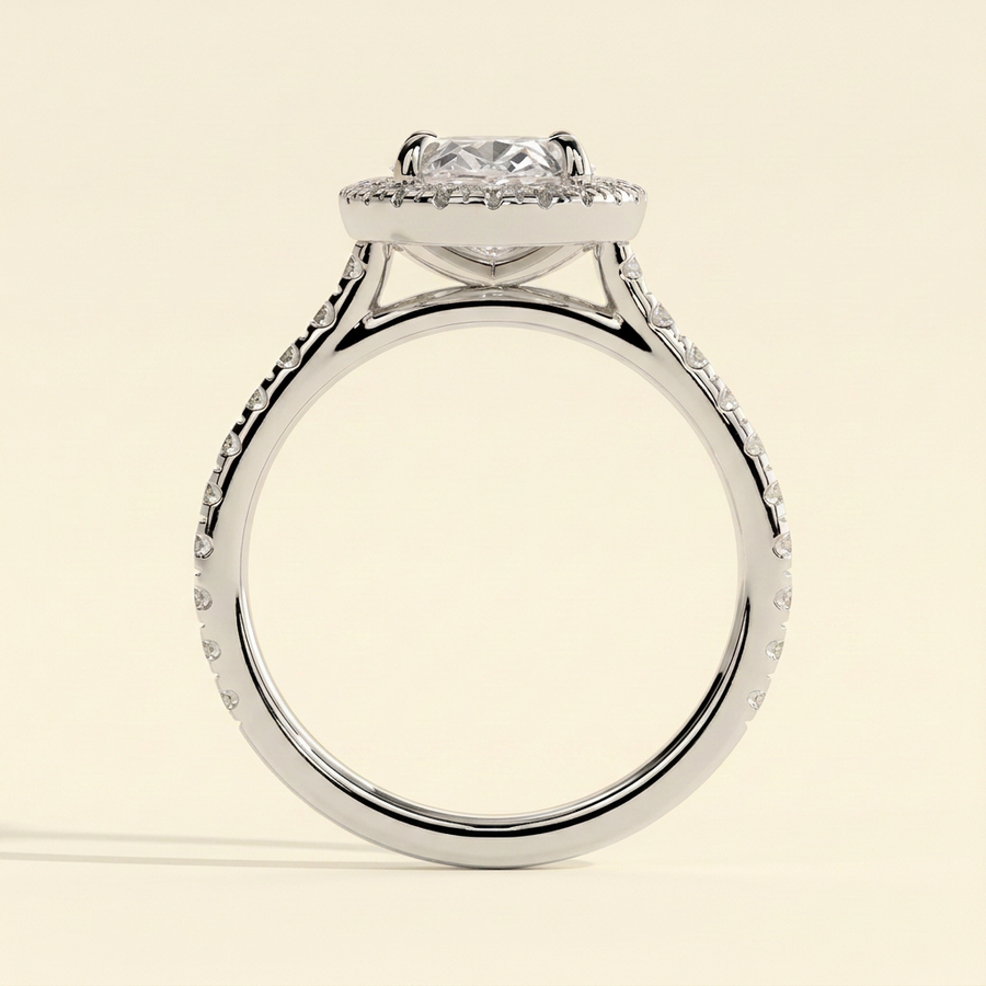 The Kavelle - Oval Cut Lab Grown Diamond Four Claw Halo Engagement Ring with Pave Band and Cathedral Setting - White Gold