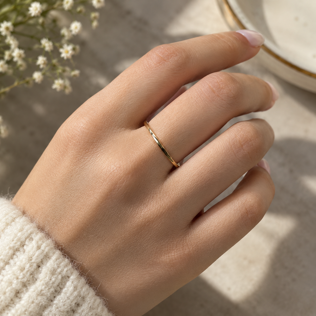 Hand model wearing diamond ring